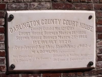 Cornerstone from the fourth courthouse on the site image. Click for full size.
