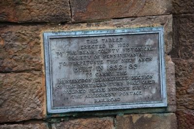 Plaque mounted on the bridge image. Click for full size.
