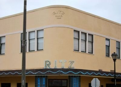 Ritz Building - detail above entrance image. Click for full size.