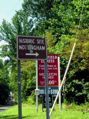Bullet riddled sign on Croom Road (MD 382) pointing to Nottingham image. Click for full size.