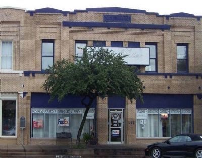 Site of Merchants Opera House Marker (left) near 117 South Beaton Street. Click for full size. Site of Merchants Opera House Marker (left) near 117 South Beaton Street image. Click for full size.