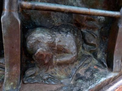 Detail on the Queen Anne statue - a puppy. Click for full size. Detail on the Queen Anne statue - a puppy image. Click for full size.