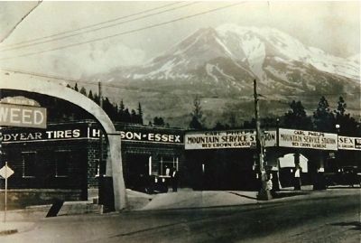 Arch, Gas Station & Mountain, Weed, California: ca. 1930 image. Click for full size.