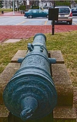 Mahan Hall Marker seen over the barrel of a cannon captured in the Mexican War image. Click for full size.