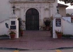 Before the most recent renovations, there were several plaques in front of the Royal Presidio Chapel image. Click for full size.