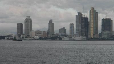 The Manila skyline - viewed from the ferry whose terminal is near. Click for full size. The Manila skyline - viewed from the ferry whose terminal is near image. Click for full size.