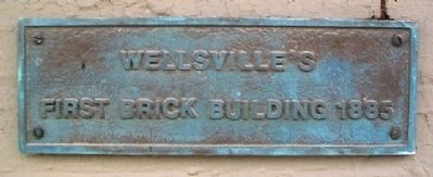 Wellsville's First Brick Building Marker. Click for full size. Wellsville's First Brick Building Marker image. Click for full size.