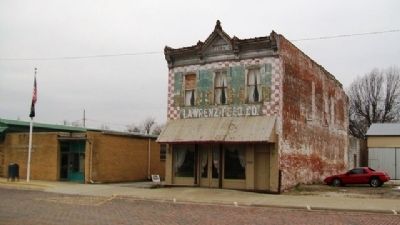Wellsville's First Brick Building and Marker. Click for full size. Wellsville's First Brick Building and Marker image. Click for full size.
