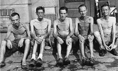 Santo Tomas Internment Camp: emaciated civilians rescued, Feb 1945 image. Click for full size.