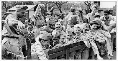 U.S. Army Nurses, rescued after three years confinement at Santo Tomas and heading for home. image. Click for full size.