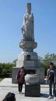 "Love and Peace" - Japanese visitors at the memorial's <i>Jibo Kannon</i> statue. Click for full size. "Love and Peace" - Japanese visitors at the memorial's <i>Jibo Kannon</i> statue image. Click for full size.
