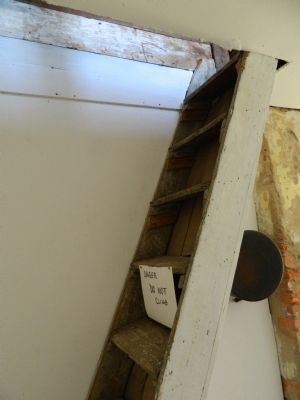 Narrow and steep stairway to upper level. image. Click for full size.