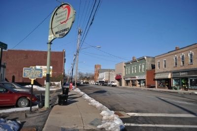 Site of First Log House Marker as seen facing West on Ridge/Main. Click for full size. Site of First Log House Marker as seen facing West on Ridge/Main image. Click for full size.