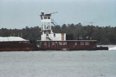 Towboat Pushing A Barge Through The Intra-Coastal Canal In The Orange Beach Area image. Click for full size.