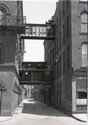 alley between main W & L E Gurley Building and machine shop building to east image. Click for full size.