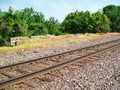 Levee Warehouse Foundation Beyond Railroad Track image. Click for full size.