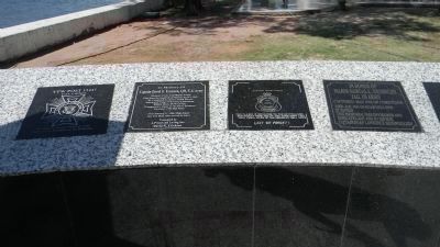 The Hellships Memorial - some of the private markers along the monument's east perimeter wall. Click for full size. The Hellships Memorial - some of the private markers along the monument's east perimeter wall image. Click for full size.