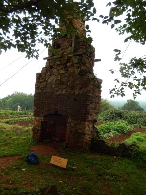 Chimney - all that remains of joiners house. Click for full size. Chimney - all that remains of joiners house image. Click for full size.