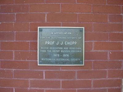 Memorial plaque on front of depot image. Click for full size.