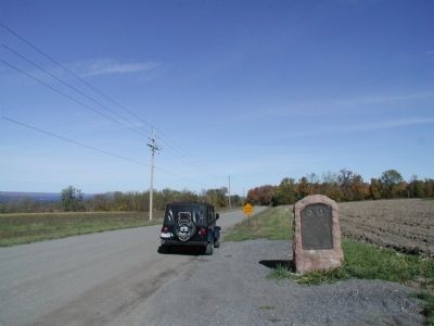Sullivan and Clinton Marker in situ facing west image. Click for full size.