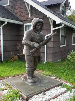 Close-up of the Alaska Native Soldier Statue at the Veteran's Memorial in Juneau image. Click for full size.