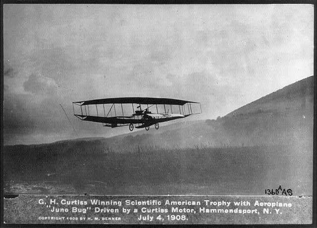 Glenn Curtiss at the Controls of The <i>"June Bug"</i> July 4, 1908. Click for full size. Glenn Curtiss at the Controls of The <i>"June Bug"</i> July 4, 1908 image. Click for full size.