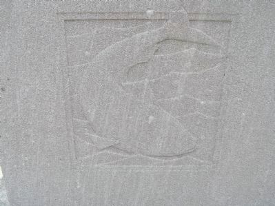 Relief carving of fish on Original Patentees Memorial Marker image. Click for full size.