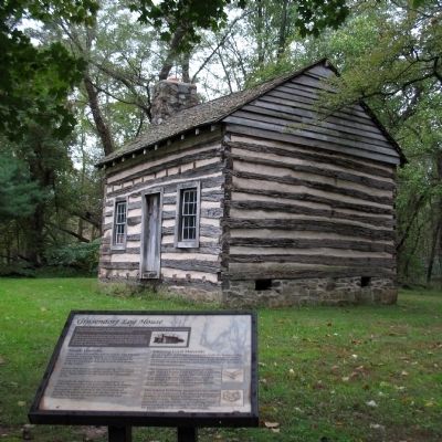 Grusendorf Log House Marker in front the Log House. Click for full size. Grusendorf Log House Marker in front the Log House image. Click for full size.