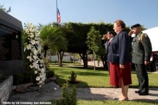 Ambassador Aponte lays a wreath at the marker. image. Click for full size.