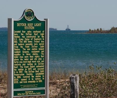 Marker with lighthouse in background image. Click for full size.