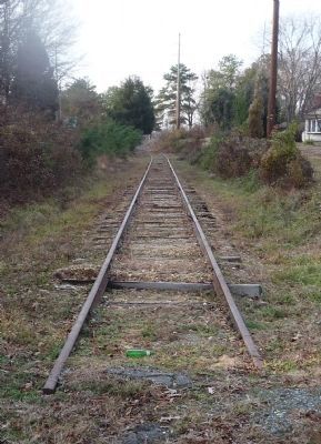 Last remnant of the Navy Railroad track - view from Mattingly St. toward the Naval Weapons Station image. Click for full size.