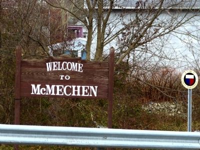 Nearby "Welcome to McMechen" sign image. Click for full size.
