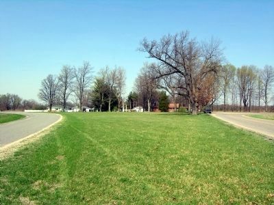 "The cemetery in the middle of the road". Click for full size. "The cemetery in the middle of the road" image. Click for full size.