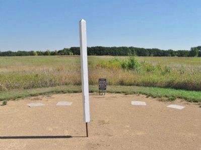 Interpretive Ground Footstep Markers and White Post. Click for full size. Interpretive Ground Footstep Markers and White Post image. Click for full size.