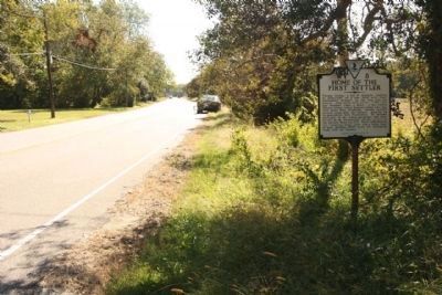 Home of the First Settler Marker, looking south along US 13 Bus. image. Click for full size.