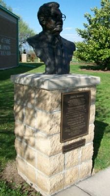 John Q. Hammons Marker and Bust image. Click for full size.