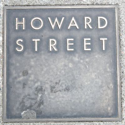 Howard Street Marker, top left plaque image. Click for full size.