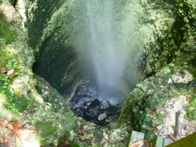 Sinkhole under the falls. Click for full size. Sinkhole under the falls image. Click for full size.