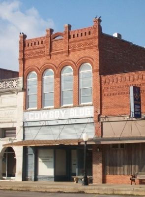 Cowboy Pink Williams Marker and Cowboy Building. Click for full size. Cowboy Pink Williams Marker and Cowboy Building image. Click for full size.