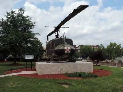 UH-IV <i>Iroquois</i> ("Huey") on display with marker panel on the left. image. Click for full size.
