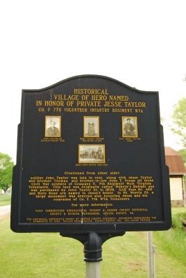 Historical Village of Hero Named in Honor of Private Jesse Taylor Marker. Click for full size. Historical Village of Hero Named in Honor of Private Jesse Taylor Marker image. Click for full size.