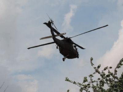 An active DC ANG helicopter preparing to land in the East Capitol Street Park image. Click for full size.