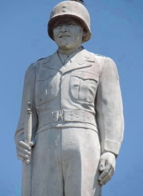Nisei soldier statue atop the column image. Click for full size.