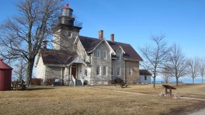 Northeastward View 30 Mile Point Lighthouse and Marker. Click for full size. Northeastward View 30 Mile Point Lighthouse and Marker image. Click for full size.