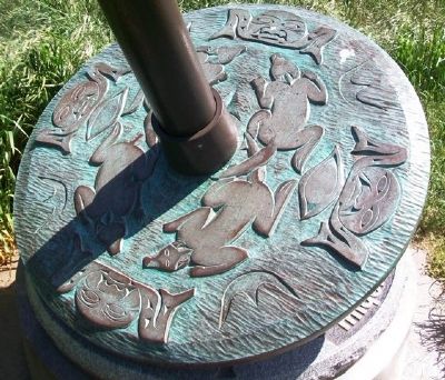 Signs of Lekwungen Spindle Whorl Sculpture Detail image. Click for full size.