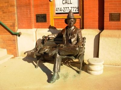 Fireman sitting outside Milwaukee Fire Dept. Engine Co. #10. Click for full size. Fireman sitting outside Milwaukee Fire Dept. Engine Co. #10 image. Click for full size.