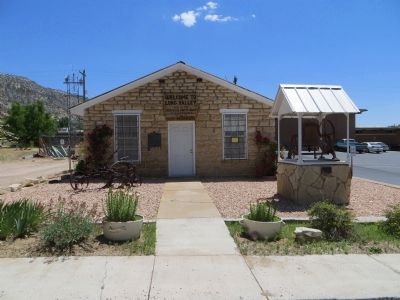 Old Rock Schoolhouse and Orderville Bell. Click for full size. Old Rock Schoolhouse and Orderville Bell image. Click for full size.