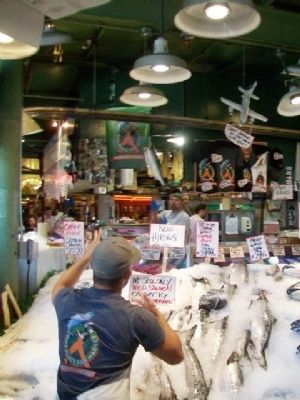 Flying Salmon at Pike Place Market. Click for full size. Flying Salmon at Pike Place Market image. Click for full size.
