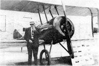 Clarence Wissler with one of his planes image. Click for full size.