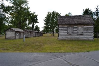 Council House and Storage Cabins. Click for full size. Council House and Storage Cabins image. Click for full size.